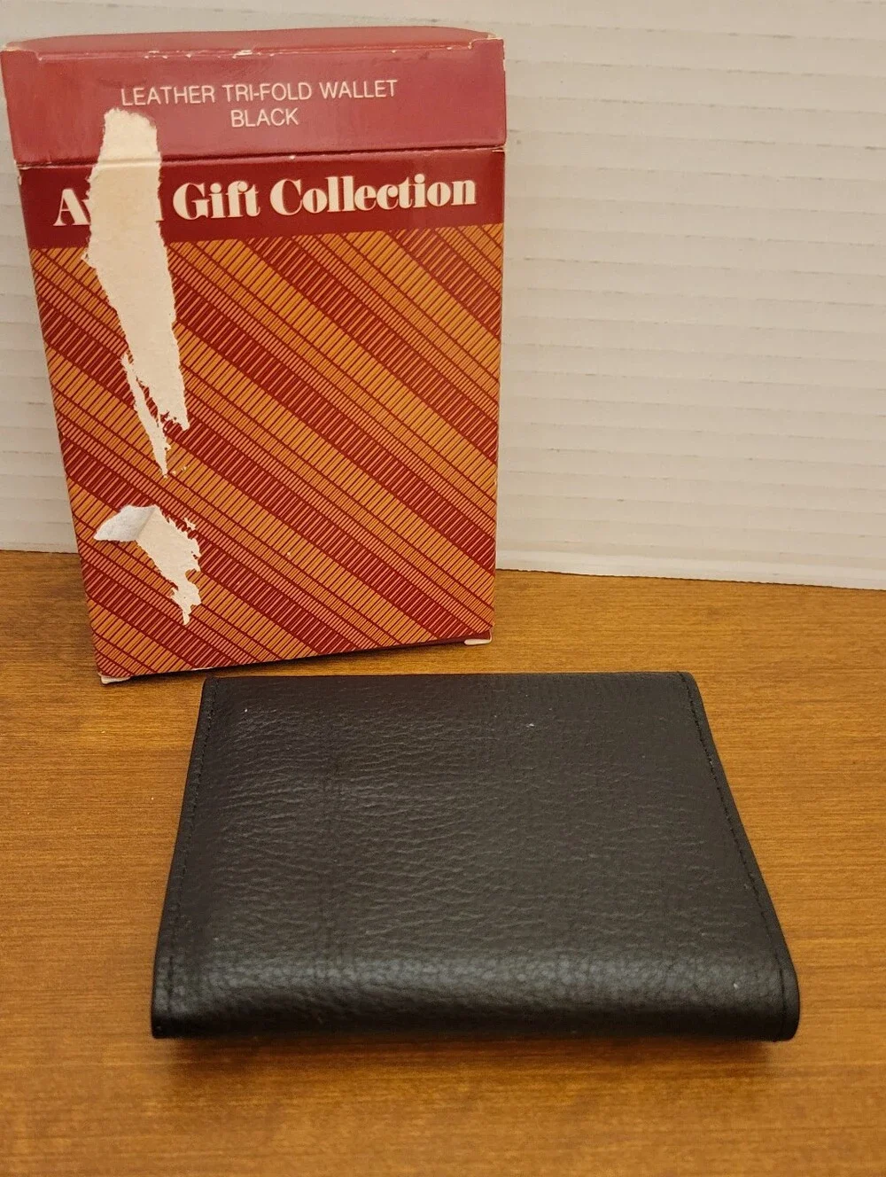 Vtg. Avon Black Leather Tri-Fold Wallet. New in Box